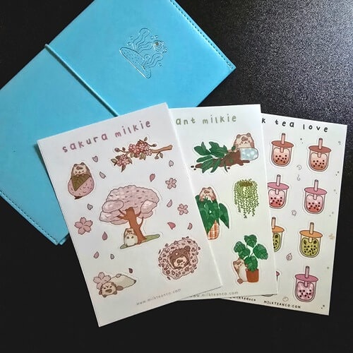 milkteanco sakura plant and boba sticker sheet on stickii club making a splash organizer on black background