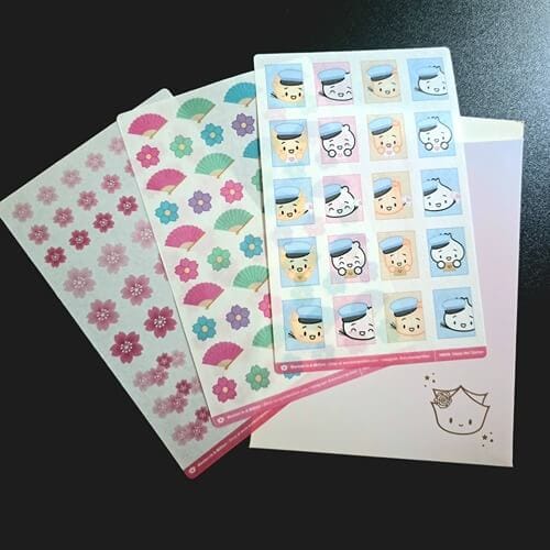 wonton in a million sakura, jade and happy mail washi stickers on black background